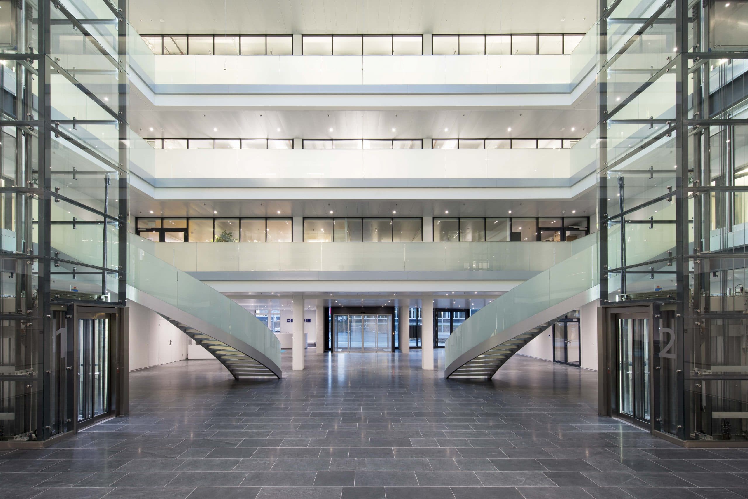 Modern office atrium with switched-on control lighting